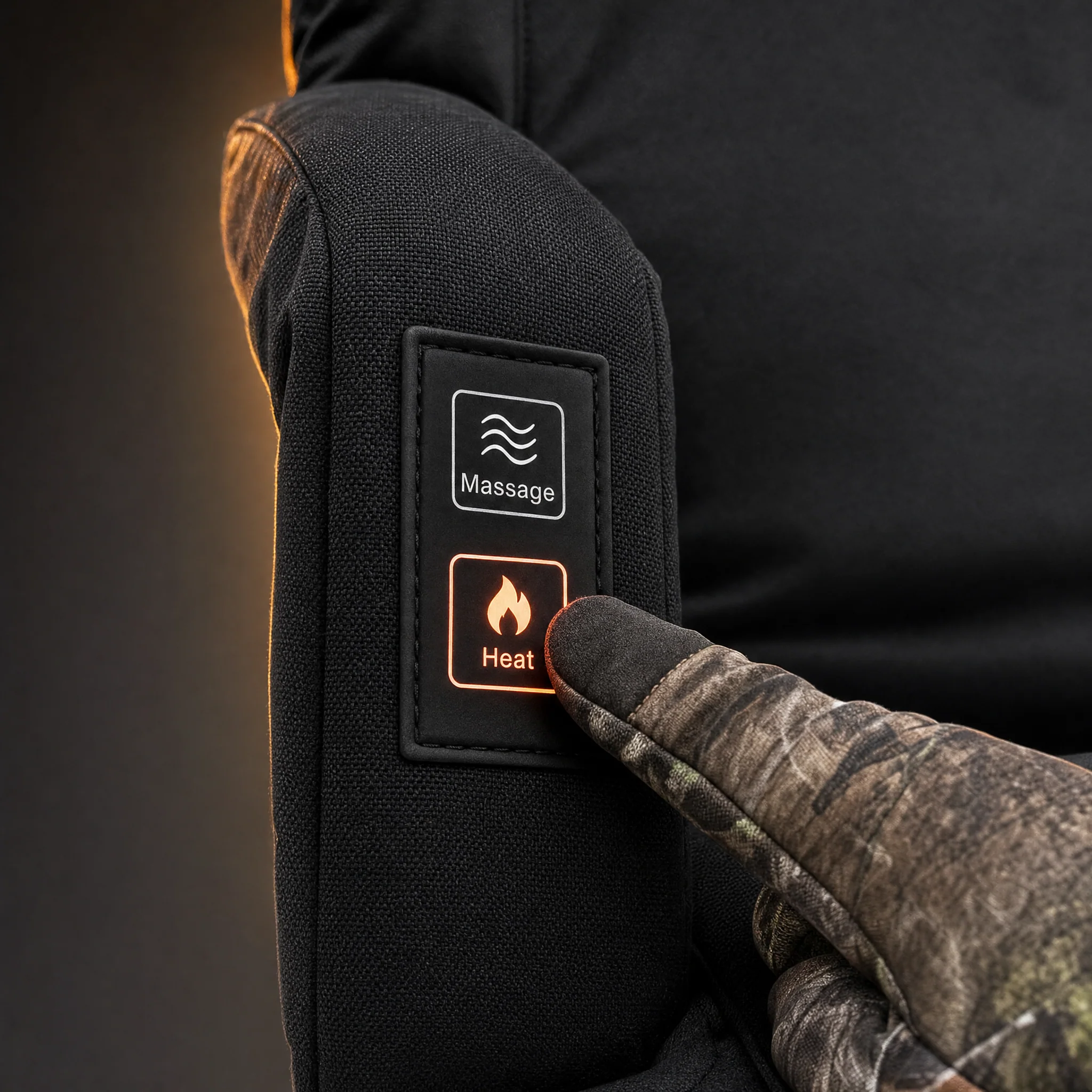 Heat and Massage buttons on the armrest